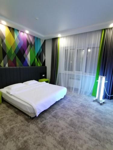 Postel nebo postele na pokoji v ubytování Aсe Hotel