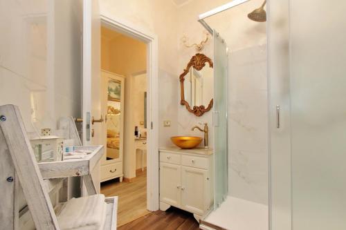 a bathroom with a sink and a shower at Just Chilling Suite in Rome