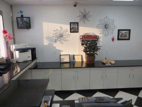 a kitchen with a counter top with snowflakes on the wall at Baymont by Wyndham Glenwood in Glenwood