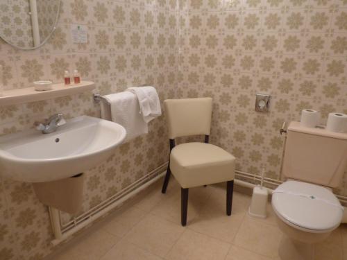 Kúpeľňa v ubytovaní Hotel du Centre