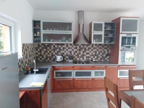 Kuchyň nebo kuchyňský kout v ubytování Bungalov v Krásné Lípě