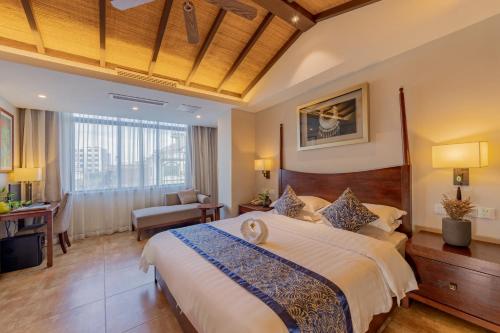 Ένα ή περισσότερα κρεβάτια σε δωμάτιο στο Lettry Hotel