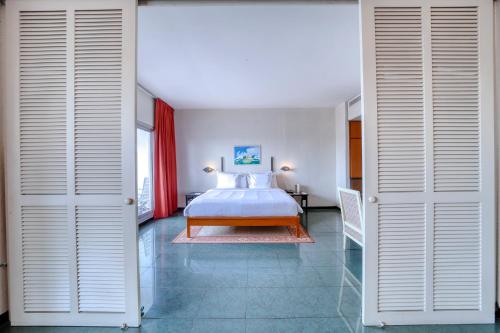 Postel nebo postele na pokoji v ubytování AKWA PALACE Douala