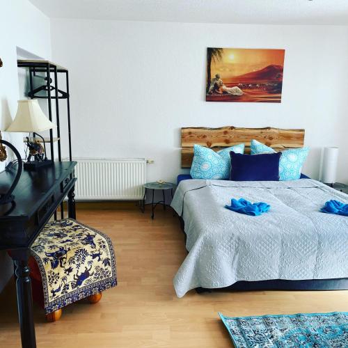 a bedroom with a bed and a piano at Ferienhaus-Aladdin in Garmisch-Partenkirchen