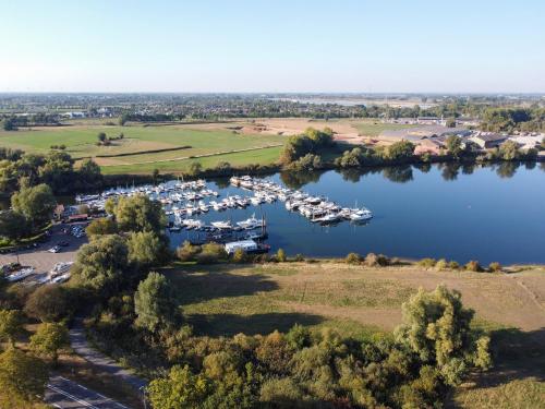 an aerial view of a marina with boats at Het Hart Van Alem in Alem