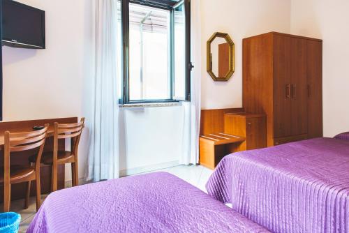 Katil atau katil-katil dalam bilik di Hotel Venini