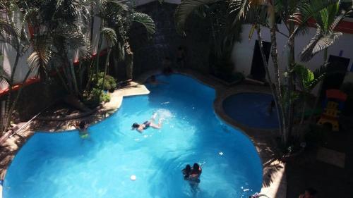 Vista de la piscina de Hotel Arena Caliente o alrededores