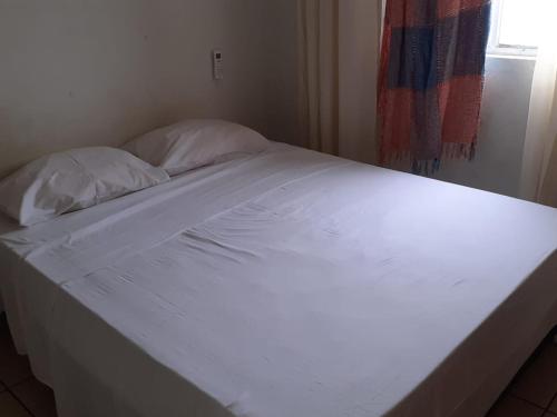 Ein Bett oder Betten in einem Zimmer der Unterkunft Lar Jampa - Bancarios