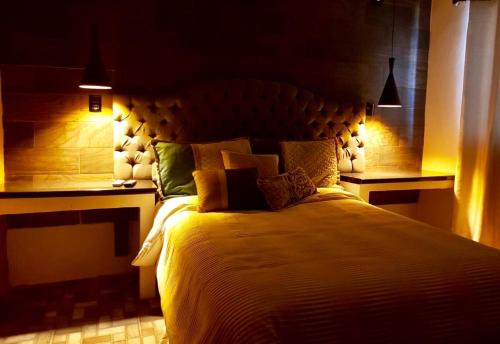 Postel nebo postele na pokoji v ubytování Casa 511 Hotel Boutique