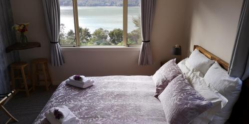 Postel nebo postele na pokoji v ubytování Moana Haven B&B