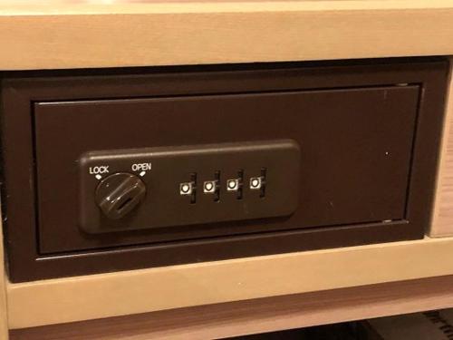 a microwave oven with a black control panel at Dormy Inn Express Kakegawa in Kakegawa