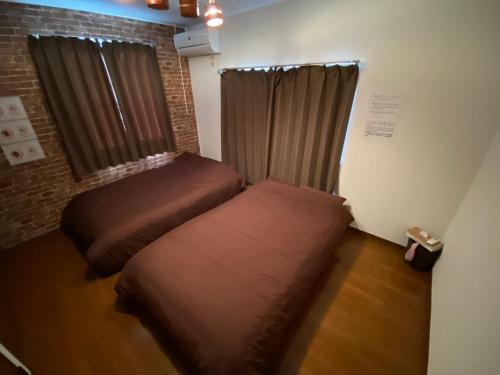 Ένα ή περισσότερα κρεβάτια σε δωμάτιο στο Hotel EL Tochigi 3 free parking