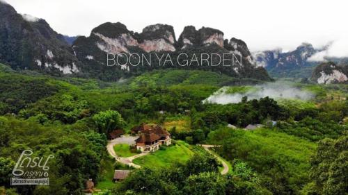 an aerial view of a house in the mountains at Billion Views Khaosok Homestay in Khao Sok