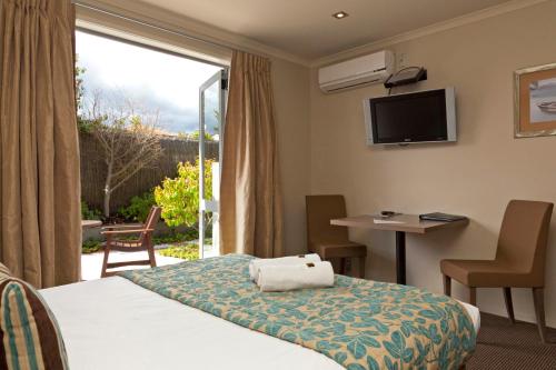 מיטה או מיטות בחדר ב-Beechtree Motel