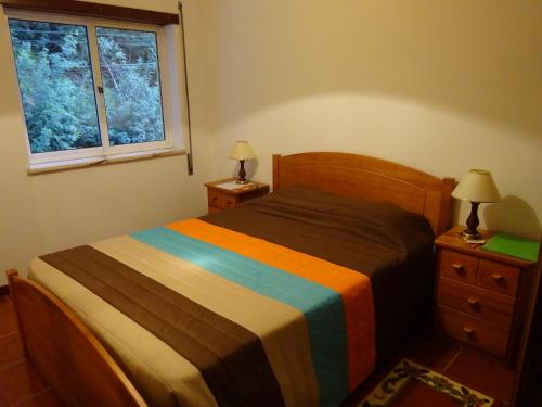 Posteľ alebo postele v izbe v ubytovaní Hospedaria Lampião