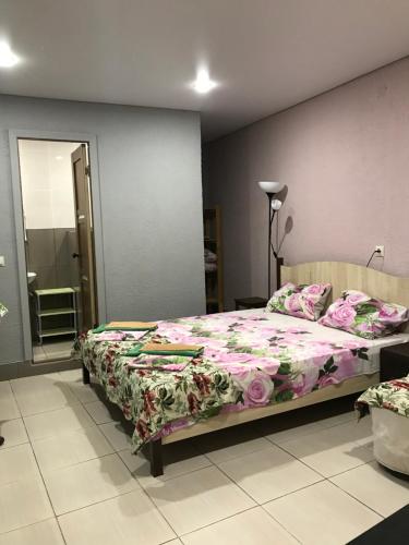 Кровать или кровати в номере Гостевой Дом «Роза» 