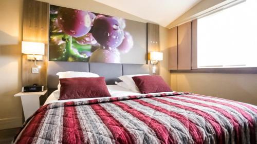 Katil atau katil-katil dalam bilik di Mercure Beaune Centre