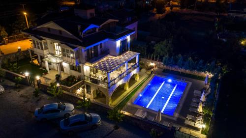 an overhead view of a house with a swimming pool at Villa TN - Fethiye in Fethiye