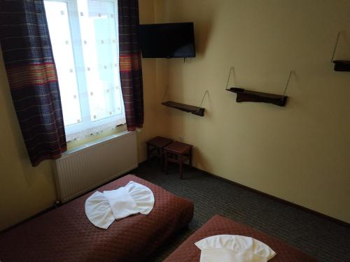 Postel nebo postele na pokoji v ubytování Оселя Драгобрат