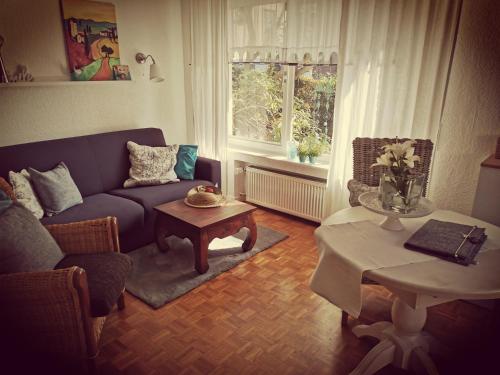 Ruang duduk di "Maison Blanche" - das gemütliche Garten-Apartment zwischen Köln und Düsseldorf