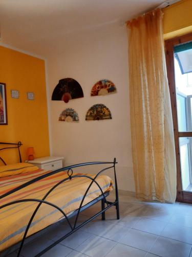 Postel nebo postele na pokoji v ubytování La casa di Carmen