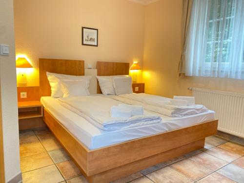 Katil atau katil-katil dalam bilik di Vintage Hotel Köln Pulheim - Kostenlose Parkplätze