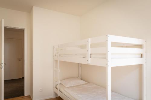 Ένα ή περισσότερα κρεβάτια σε δωμάτιο στο Spacious modern appartments in the heart of Brussels