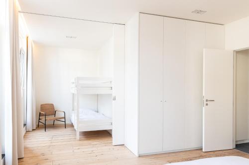 Ένα ή περισσότερα κρεβάτια σε δωμάτιο στο Spacious modern appartments in the heart of Brussels