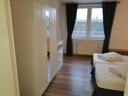 Giường trong phòng chung tại Ferienwohnung Breitling