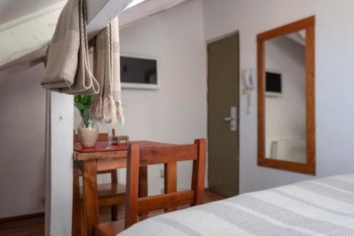 Ένα ή περισσότερα κρεβάτια σε δωμάτιο στο Providencia Bed & Breakfast