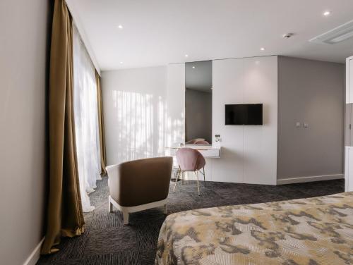 Postel nebo postele na pokoji v ubytování Özkum Park Otel
