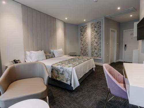 Postel nebo postele na pokoji v ubytování Özkum Park Otel