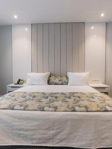 Postel nebo postele na pokoji v ubytování Özkum Park Otel