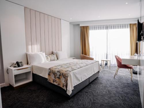 Postel nebo postele na pokoji v ubytování Özkum Park Otel