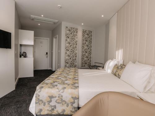 Postel nebo postele na pokoji v ubytování Özkum Park Otel