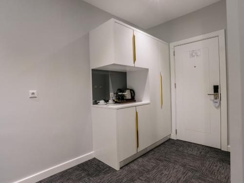 Kuchyň nebo kuchyňský kout v ubytování Özkum Park Otel