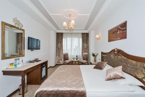 Кровать или кровати в номере Antis Hotel-Special Category