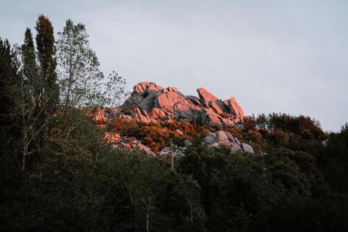 a pile of rocks on top of a mountain at Vallicciola Nature Hotel in Tempio Pausania