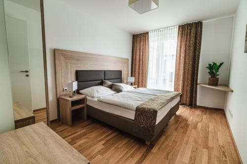 En eller flere senge i et værelse på Albert Schweitzer Center Graz