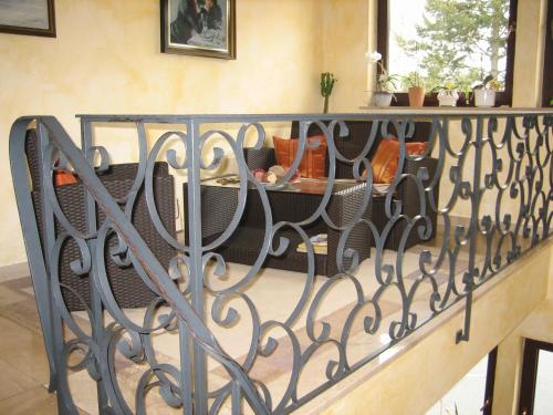 a balcony with a wrought iron railing at Hotel Pirsch in Ramstein-Miesenbach