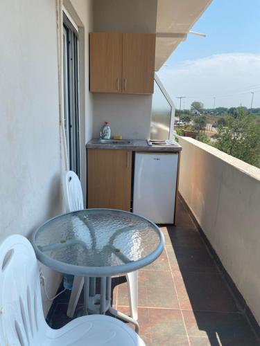 Η κουζίνα ή μικρή κουζίνα στο Etna Apartments