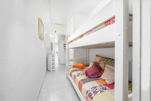 Двох'ярусне ліжко або двоярусні ліжка в номері Apartamento 15 Edificio Canopus
