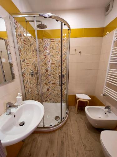a bathroom with a shower and a sink at Sapore di Mare Holidays in Maiori