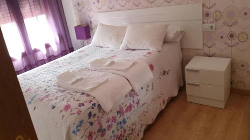 Cama o camas de una habitación en Apartamento en Ventanielles Oviedo