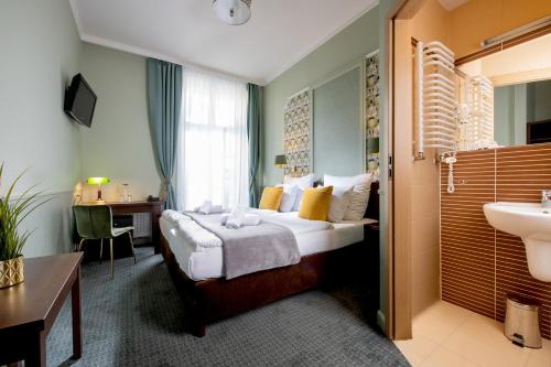 Posteľ alebo postele v izbe v ubytovaní Amber Boutique Hotels - Hotel Amber