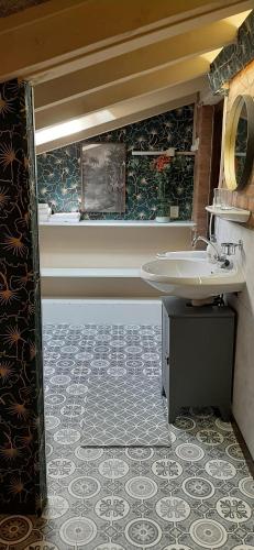 a bathroom with a sink and a shower at Villa Berk en Heide in Rosmalen