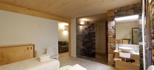 a bathroom with a sink and a mirror at Aristondo Pentsioa in Getaria