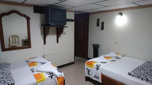 Postel nebo postele na pokoji v ubytování Apartamento Rosita