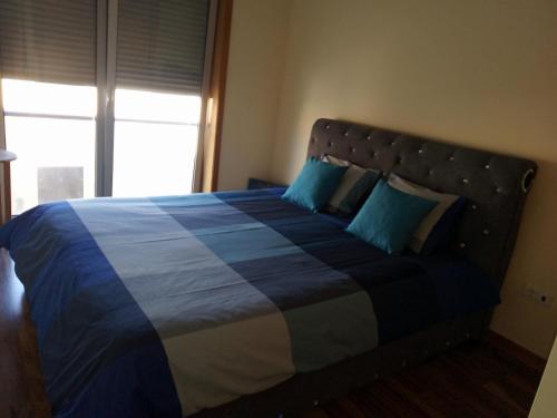 Un pat sau paturi într-o cameră la Barranha Beach House