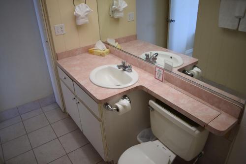 a bathroom with a sink and a toilet at Hale Kai O'Kihei 305 in Kihei